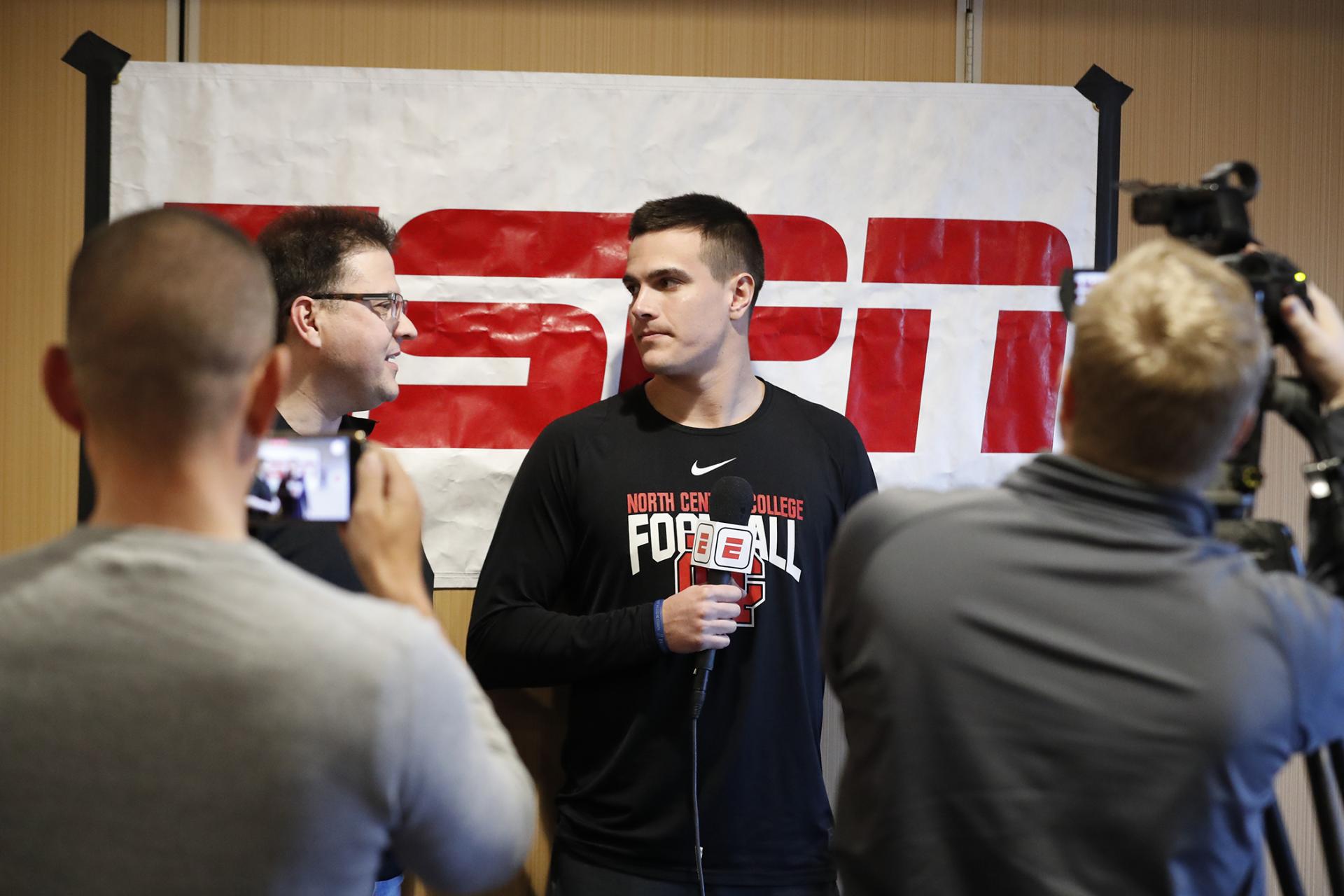 North Central College quarterback Broc Rutter answering questions.