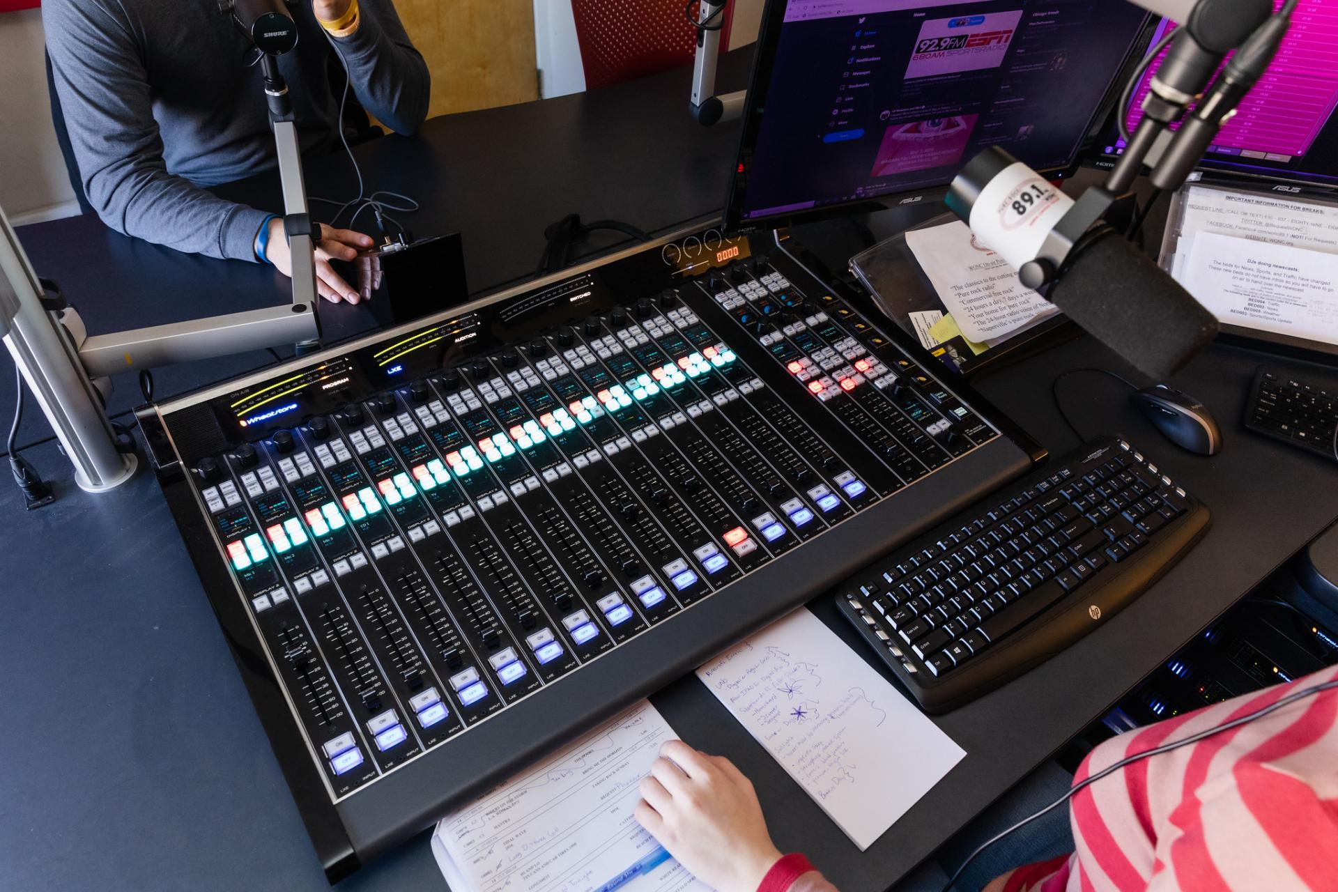 A top-down view of the Wheatstone LXE console used at WONC radio.