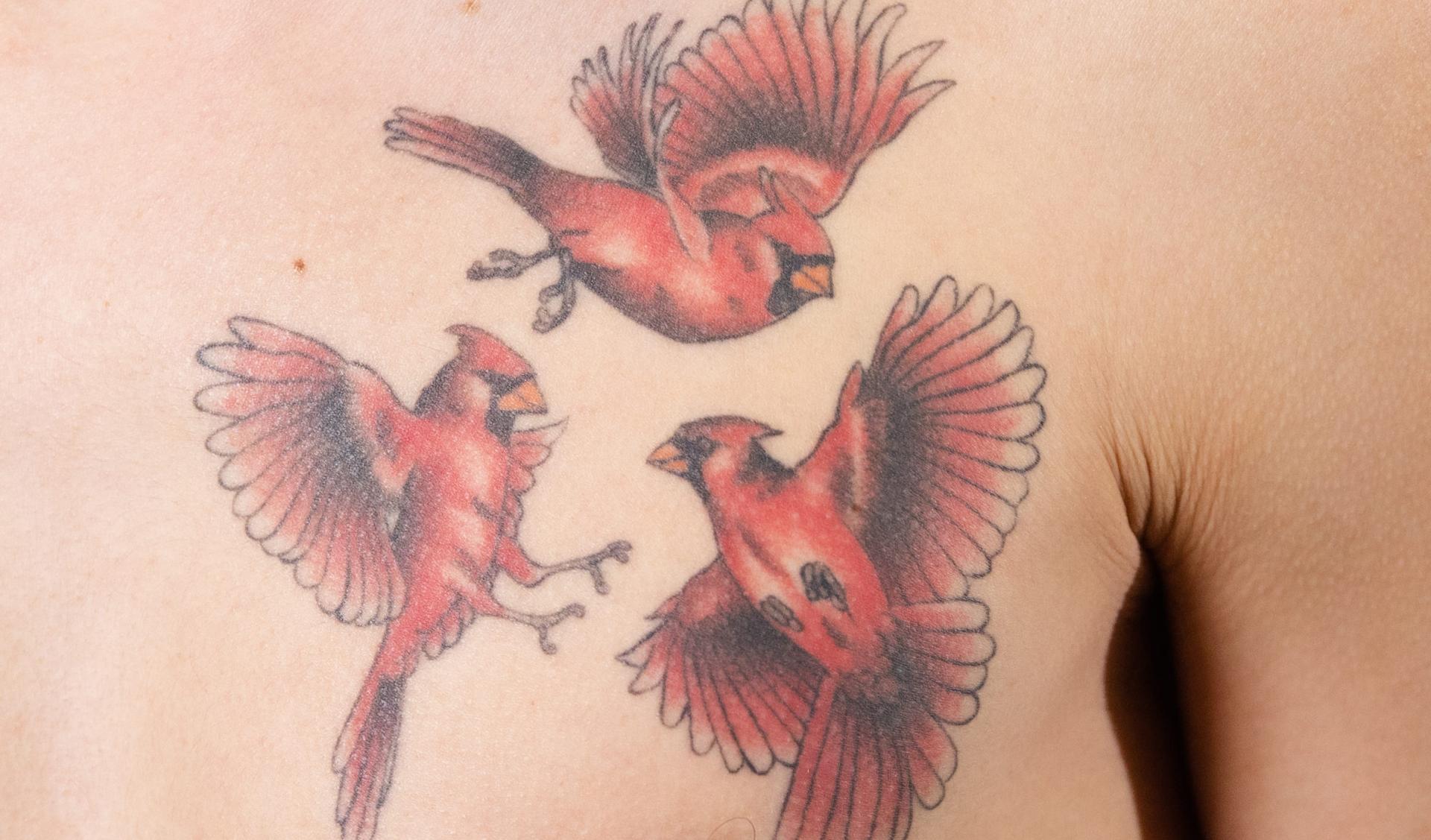 Matt Osmulski's three cardinals tattoo.