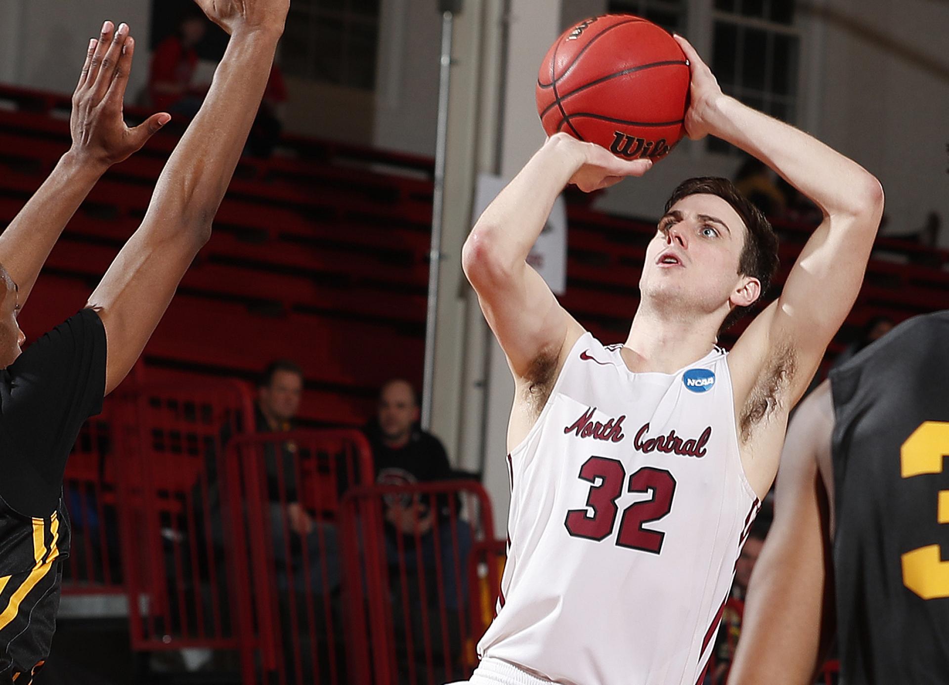 Connor Raridon takes a jump shot during a North Central men's basketball game.