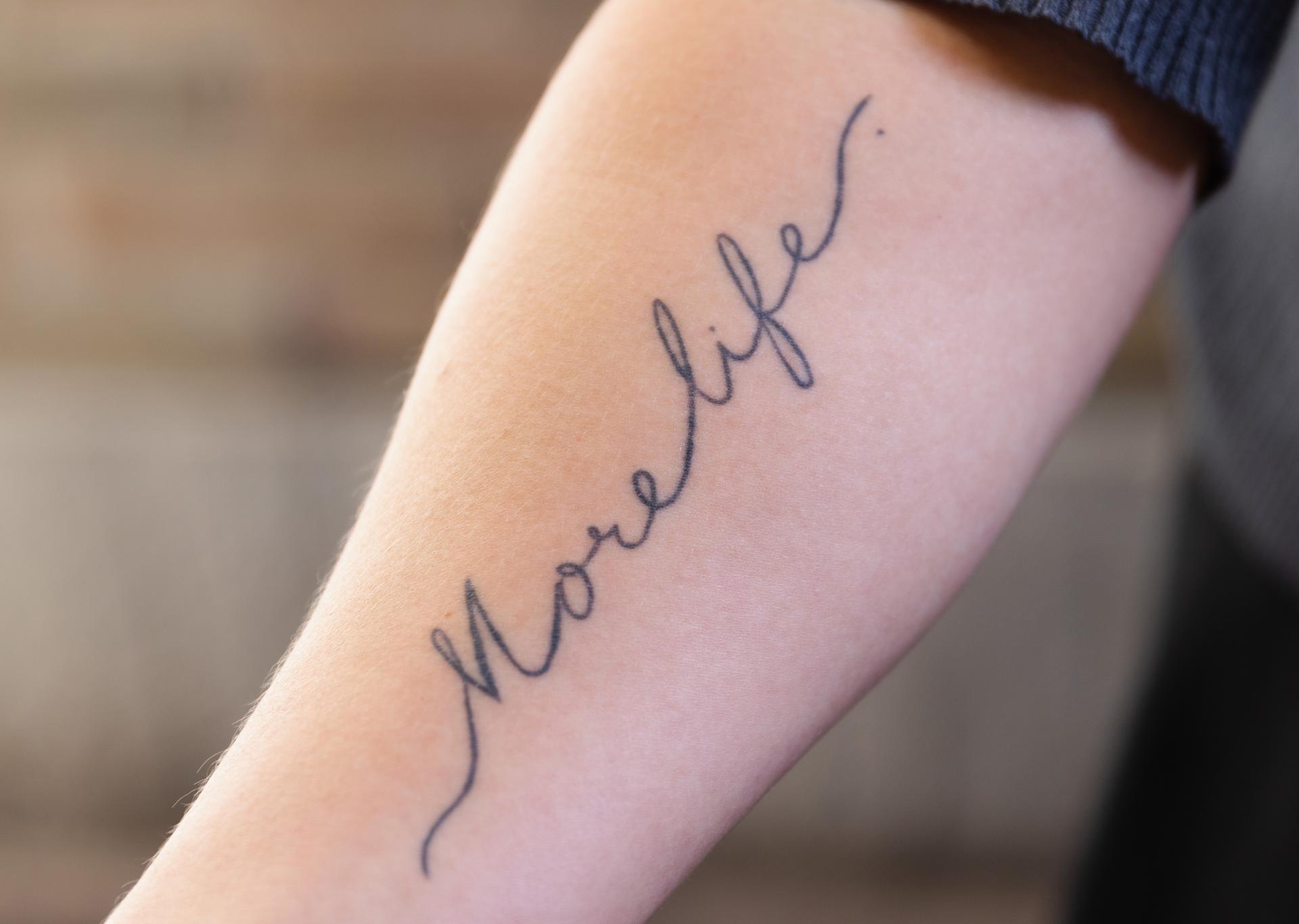 Megan Paustian's "More Life" tattoo.