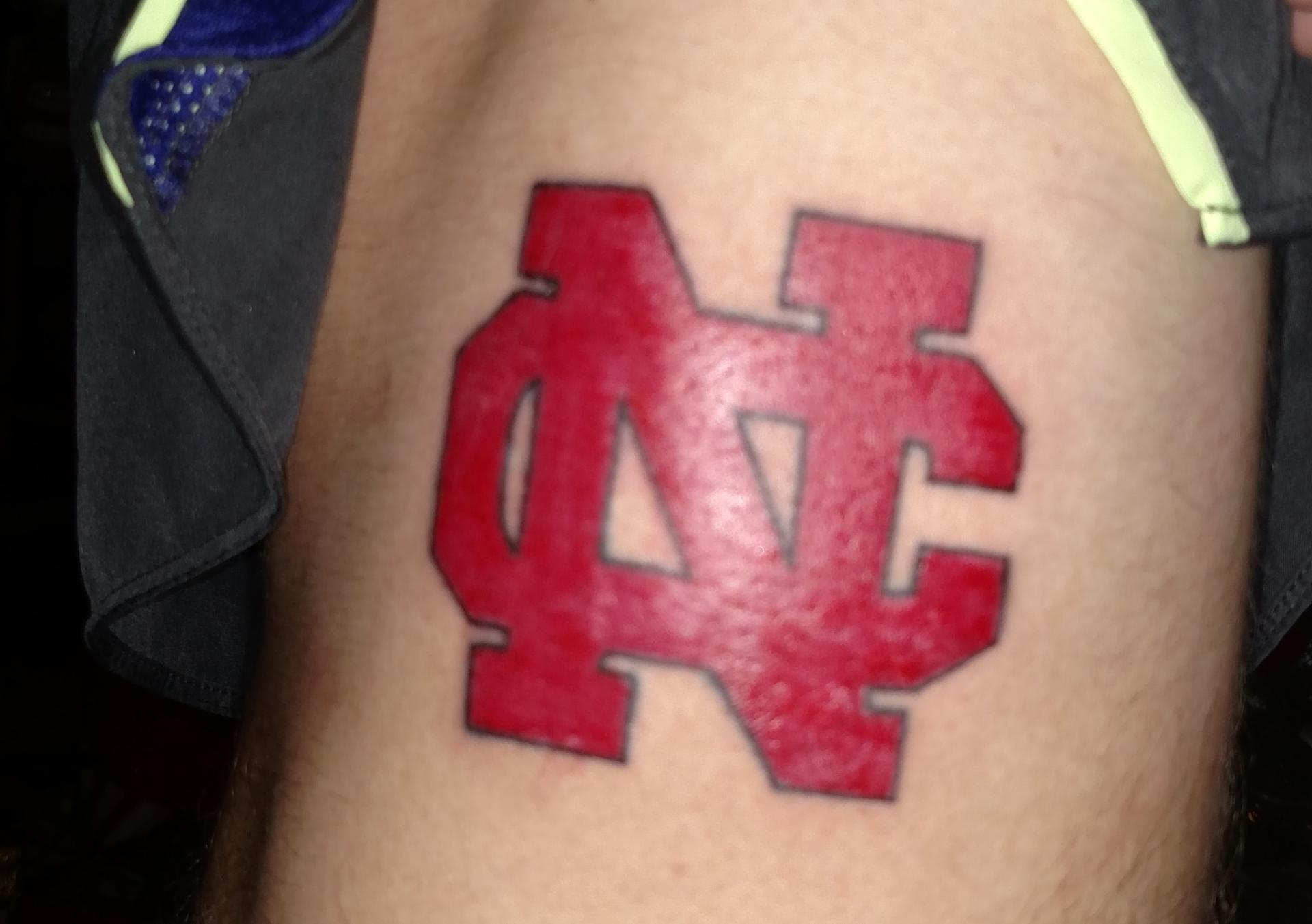 A North Central College block logo tattoo.