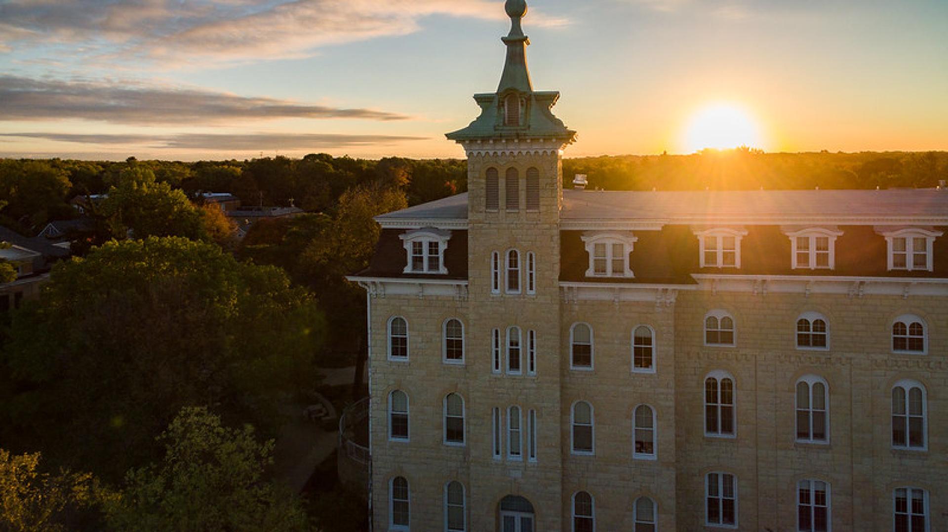 A picture of Old Main at sunrise