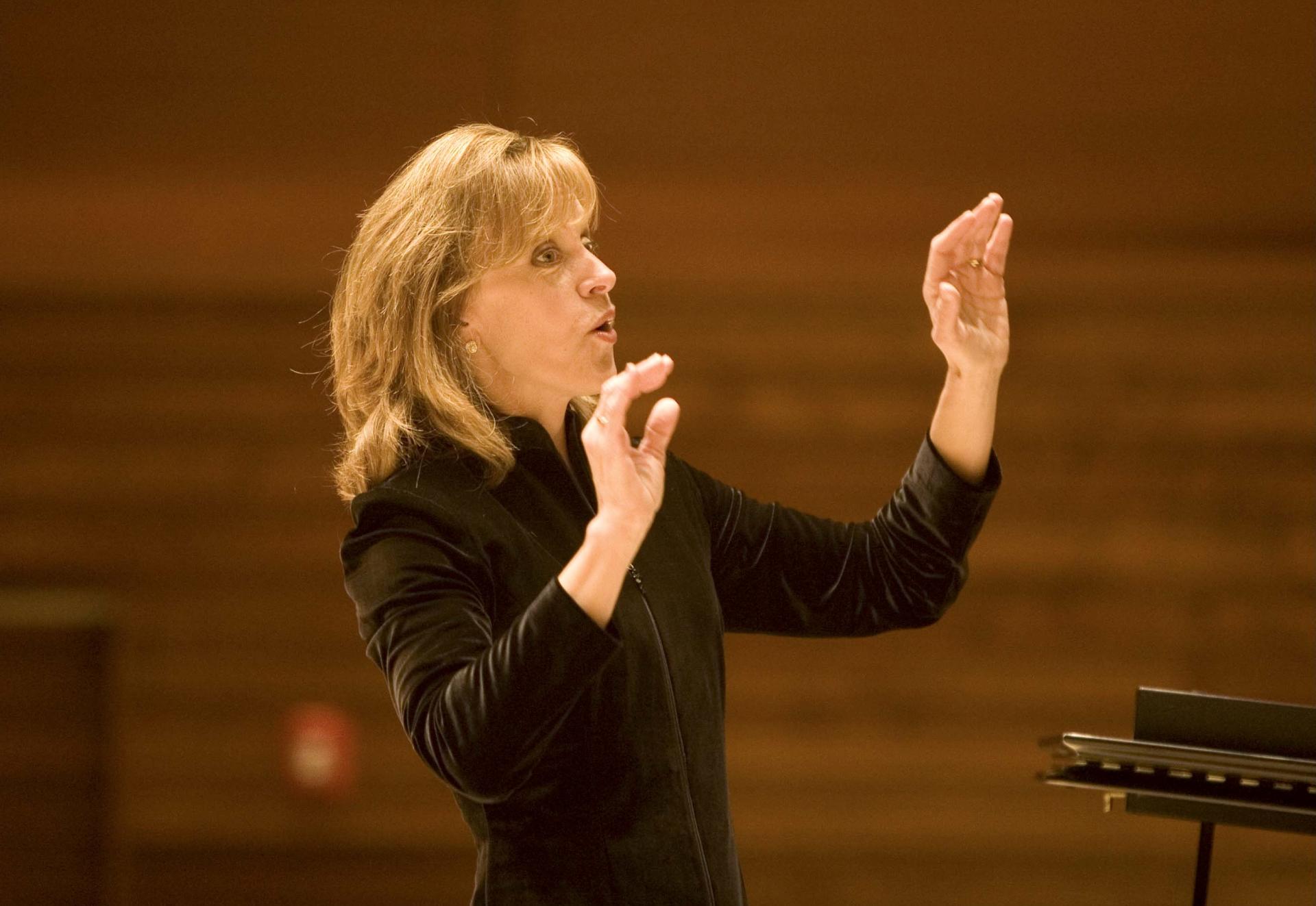 North Central College choral professor Ramona Wis conducting.