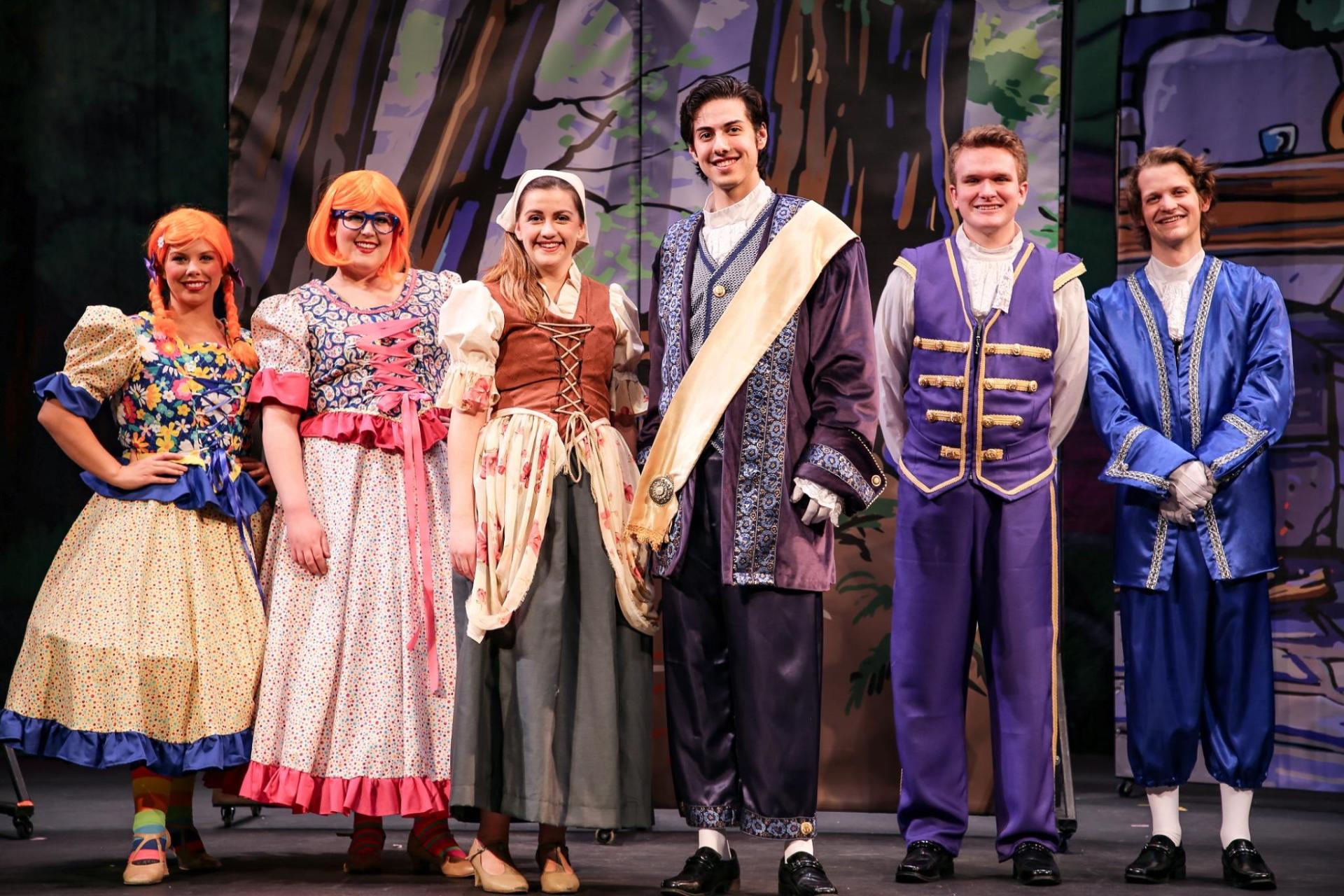 The cast of Cinderella on stage.