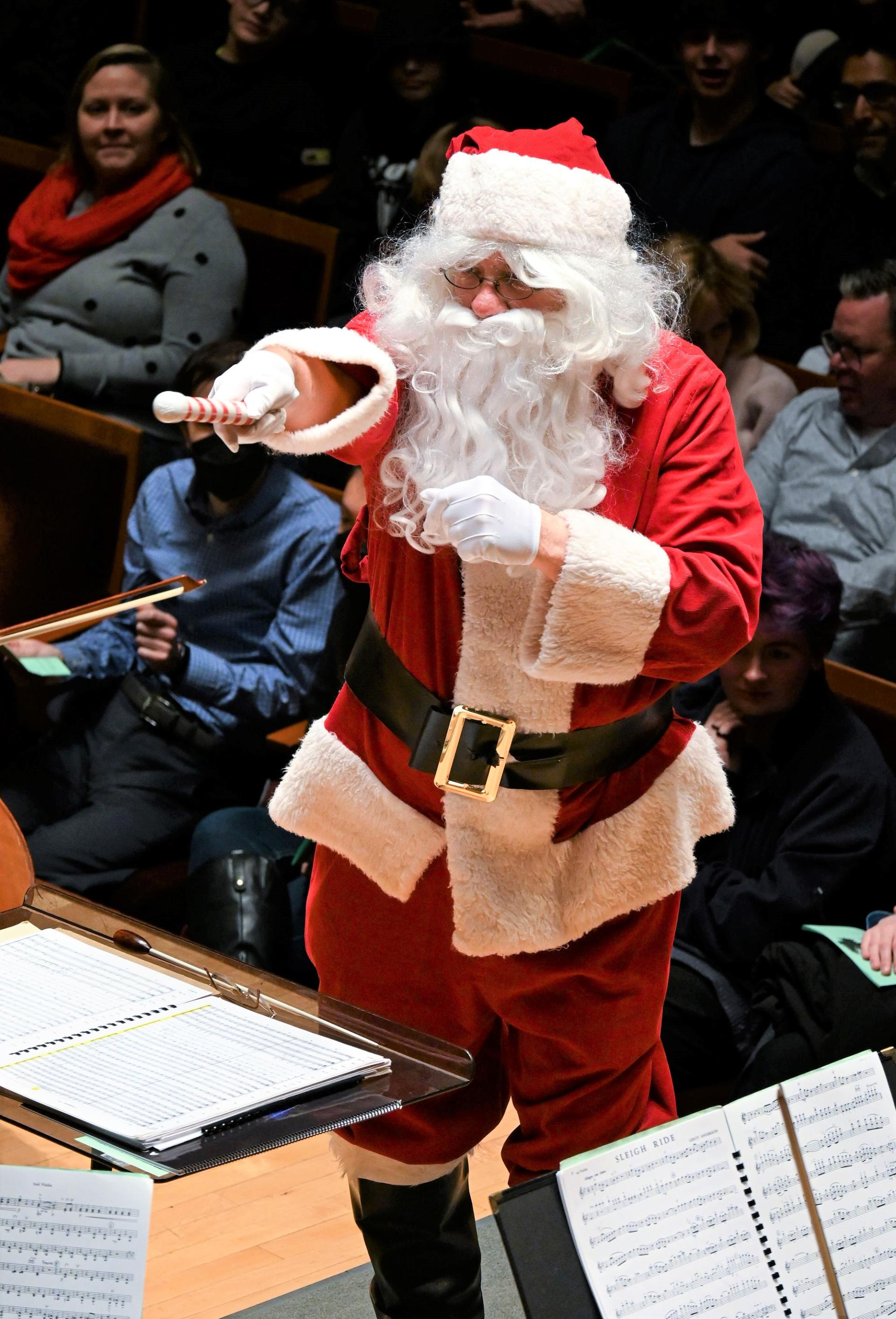 Santa Claus directs the DuPage Symphony Orchestra.