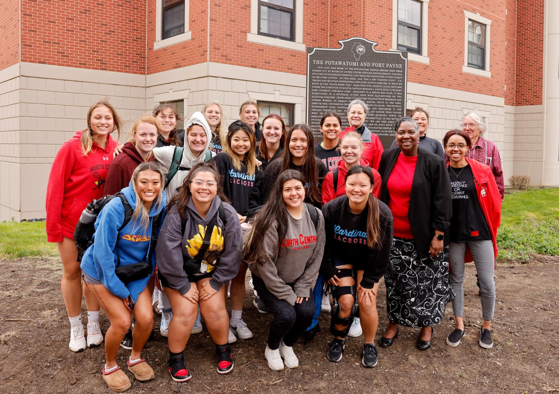 History students in front of the new historical marker at North Central College.