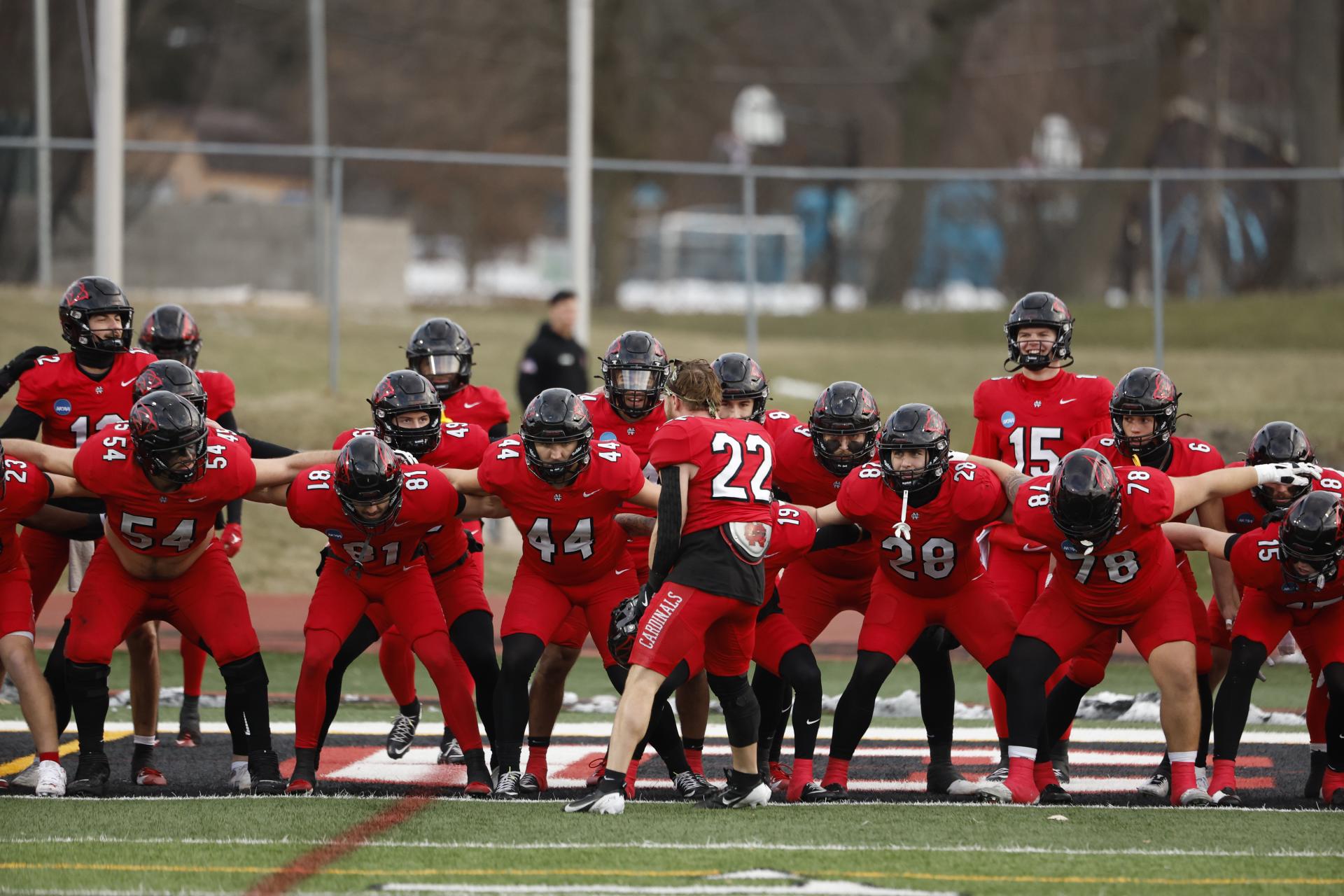 North Central football players in a huddle