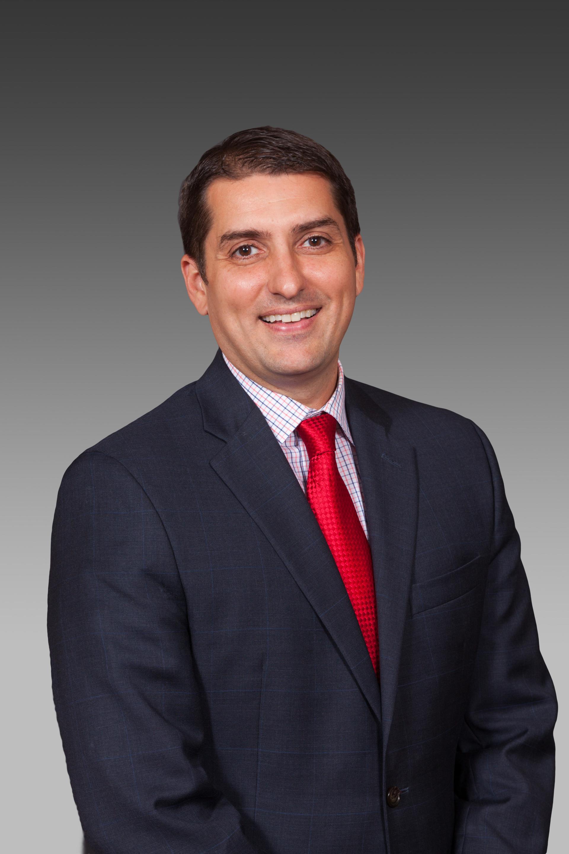 Dr. Stephen Maynard Caliendo, dean of the College of Arts and Sciences at North Central College, poses for a headshot