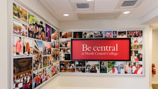 North Central College Old Main Entrance sign "Be Central"