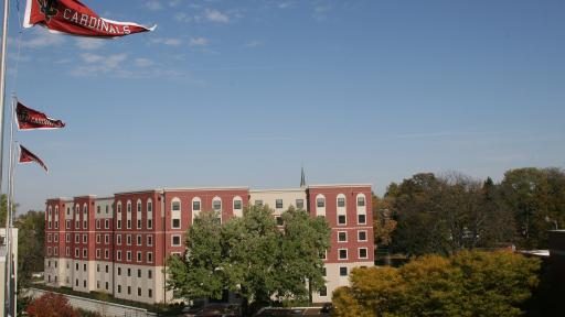New Residence Hall with flags in front