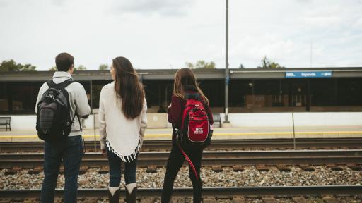 students at train station