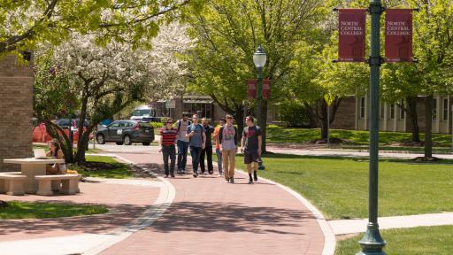 group of students walking on campus