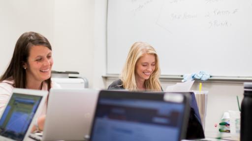 students researching online in class