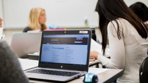 students on their computers stuyding