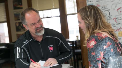 professor and student talking