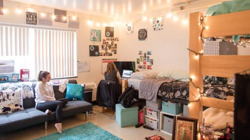 students in residence hall room