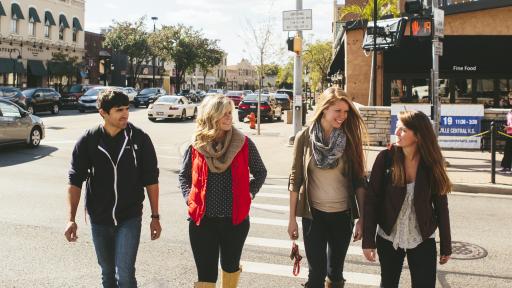 students walking around downtown naperville