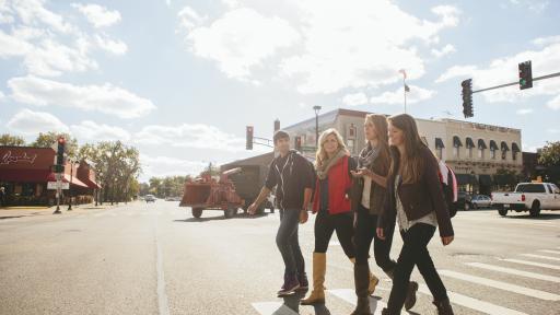 students walking around downtown naperville