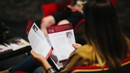 student looking at handout