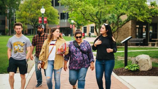 student and family on campus