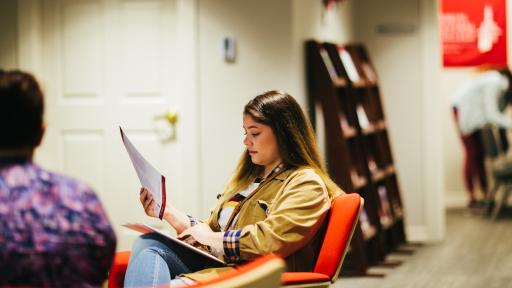 student reviewing papers