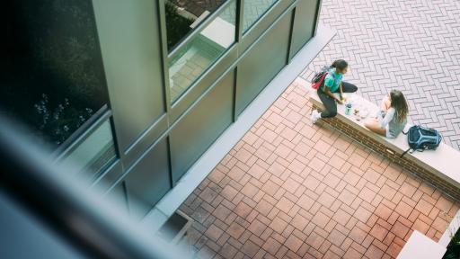 students sitting on campus