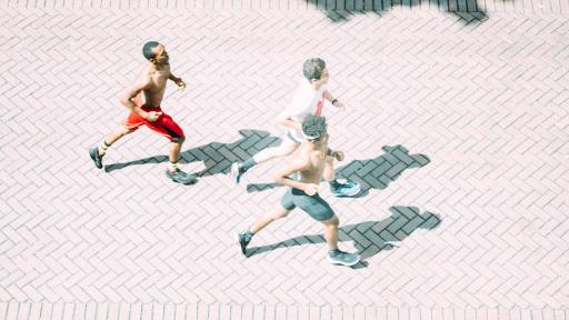 students running around campus