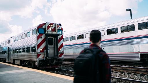 student at train station