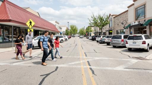 student walking around downtown naperville