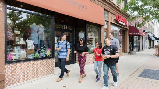 students walking around downtown naperville