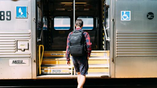 student at train station