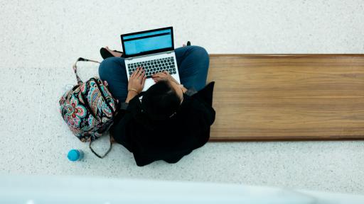 student studying on their laptop