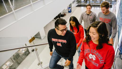 Students walking up staircase