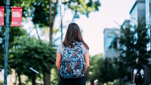 student walking on campus