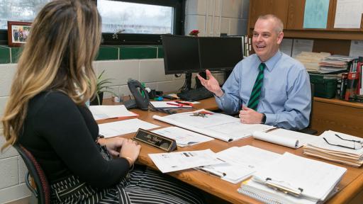 School administrators talking