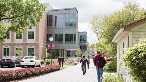 Students walking on path towards Wentz Science Center