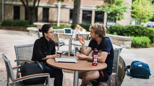 Advisor talking to student