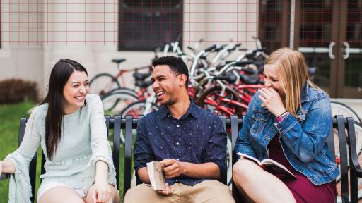 Students sitting on bench