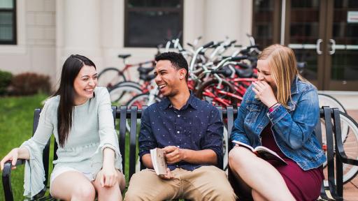 Students sitting on a bench