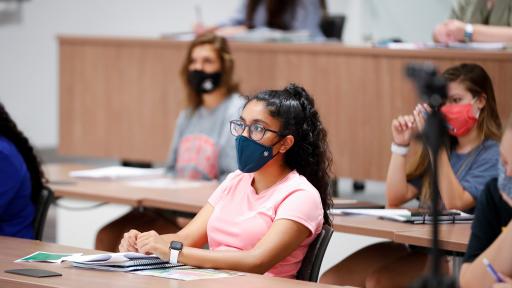 student wearing a mask in class