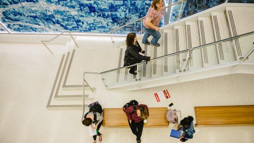 Students walking up staircase