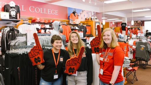 Students at campus store with NCC gear