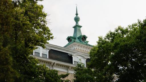 Old Main popping out through the trees.