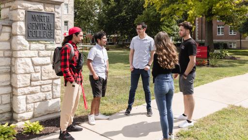 Four North Central College students walking to class.