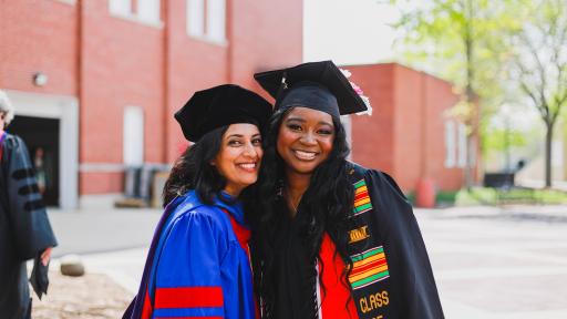 Two North Central College students at Commencement.