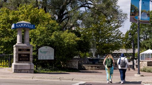 A photo of students walking in Downtown Naperville.