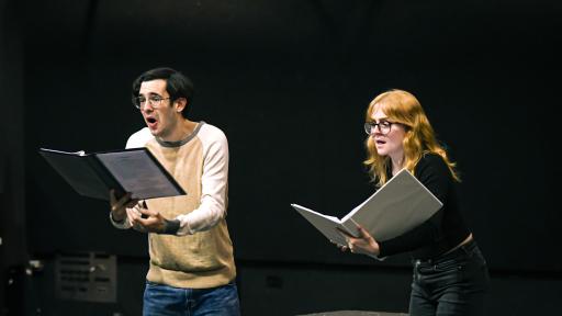 A photo of two students performing in "The Serpent Lady."