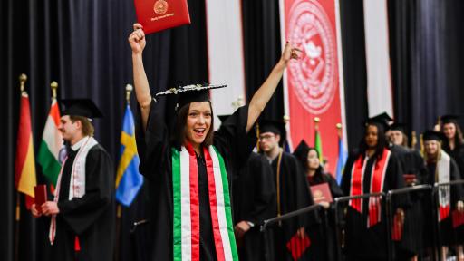 Student celebrating at commencement