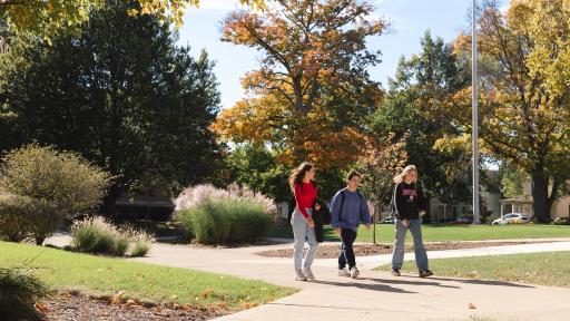 students walking through campus